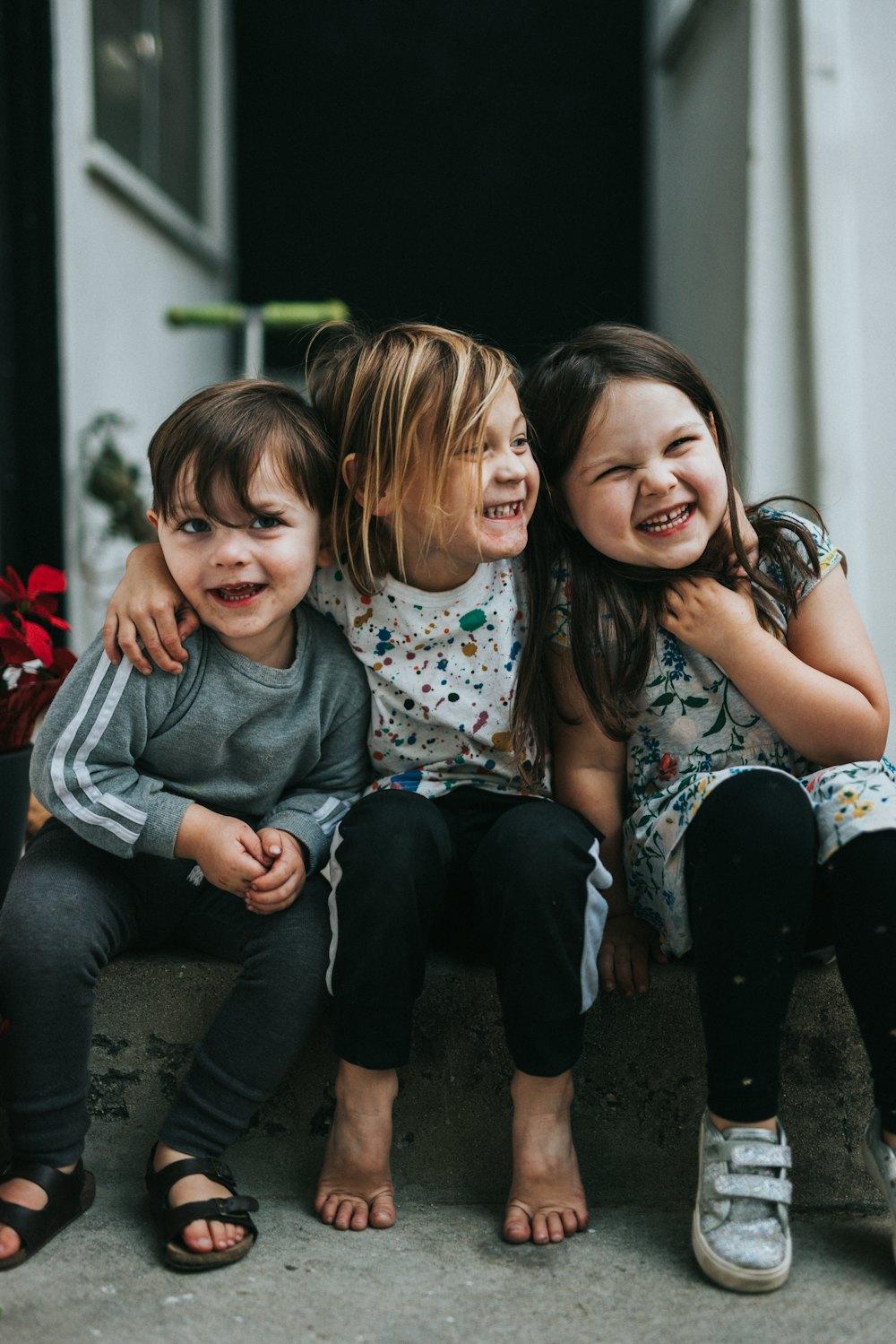 Happy young children smiling together